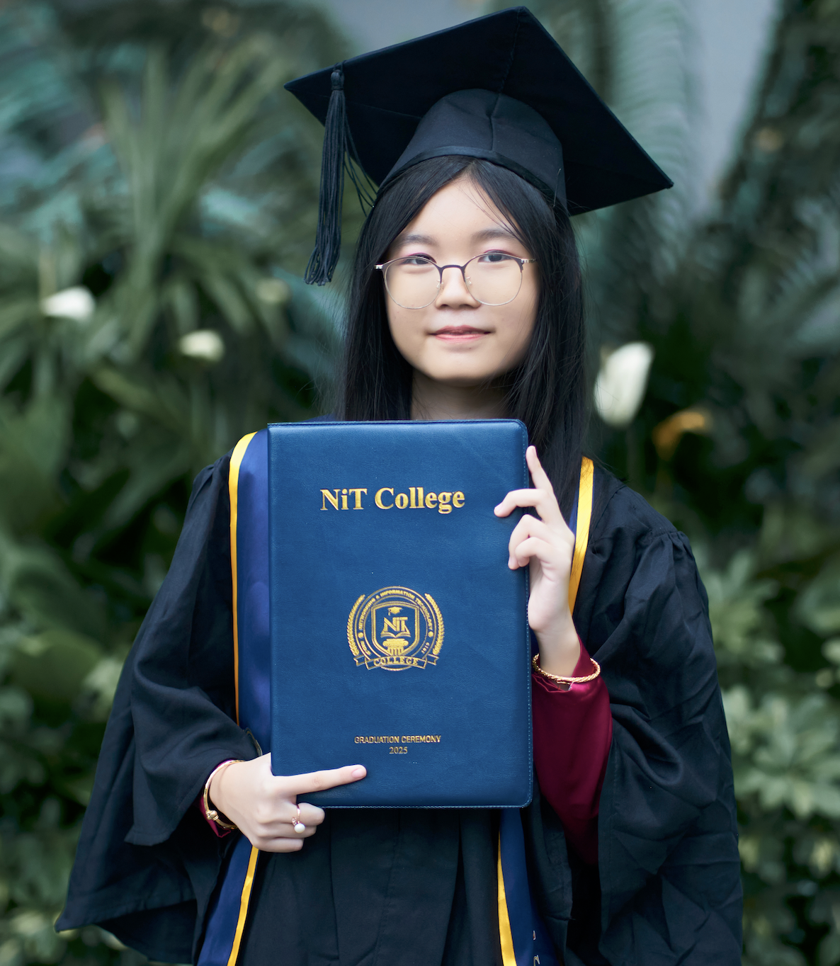 NIT College student in graduation attire